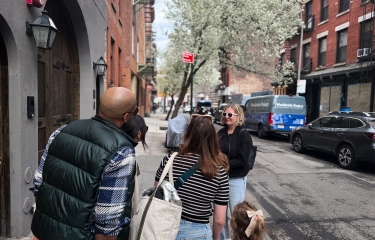 Tour group on a sidewalk in the West Village, NYC